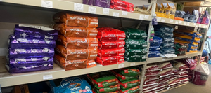 Our shelves filled with pet food from brands like Fromm, Diamond Naturals, Purina, Taste of the Wild, and more!